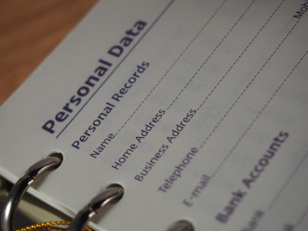 Close up of a notebook with personal data on it detailing everything you need to know about GDPR compliance.