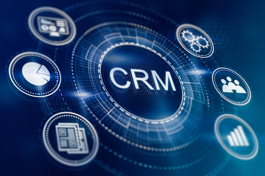 The word crm is shown on a blue background, highlighting the role of CRM integration in effective marketing attribution strategies.