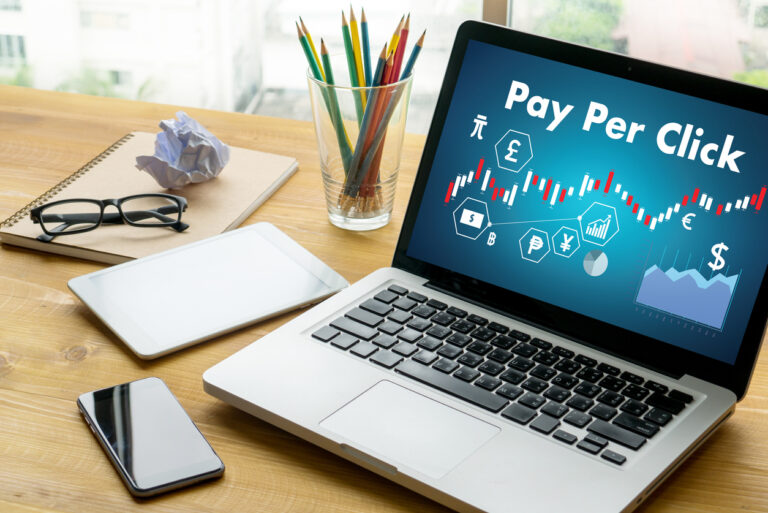 A laptop showcasing the power of pay per click advertising for marketing leaders.