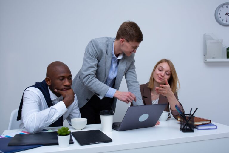 A group of people brainstorming at a table.
